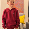 Sieht einfach top aus: Max, 9 Jahre alt, in seinem Kinder-Hoodie Luke mit Saar-Wappen.